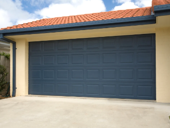 how to increase your homes curb appeal with the right garage door color photo