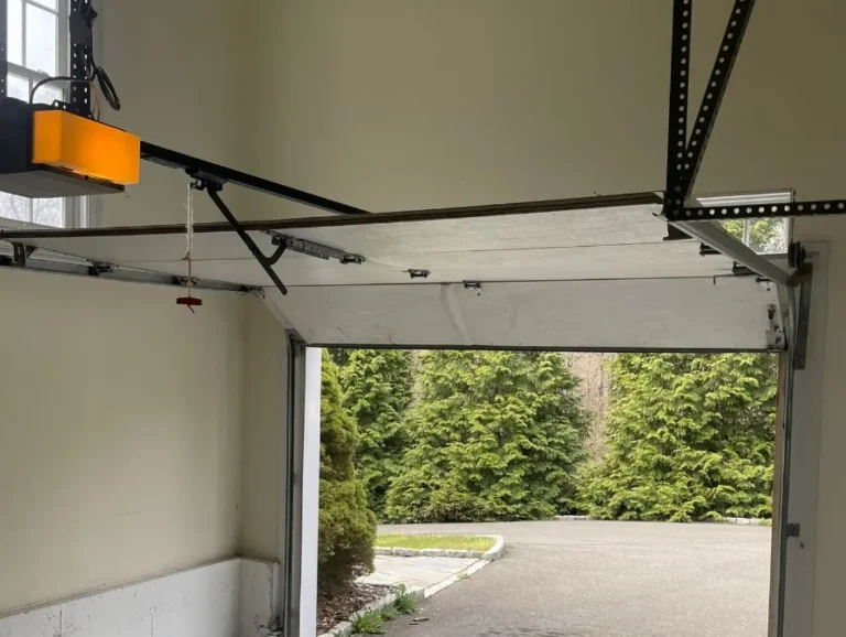 understanding garage door track alignment how to fix it photo