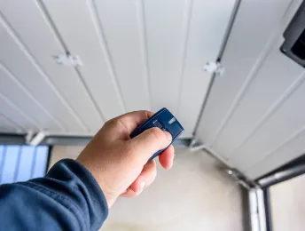 why every business needs a reliable garage door opener photo